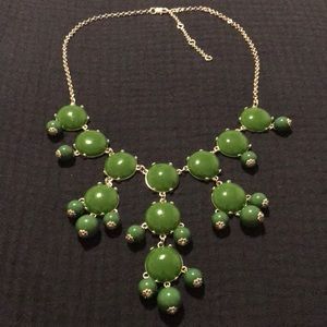 Silver statement bubble necklace with green gems/beads